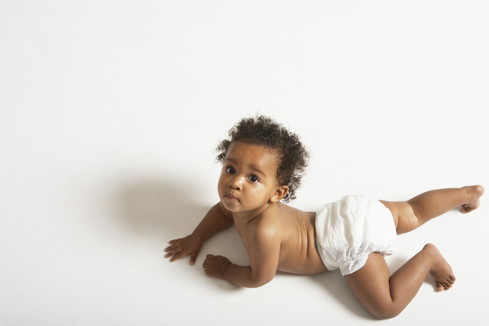 Baby crawling in nappy